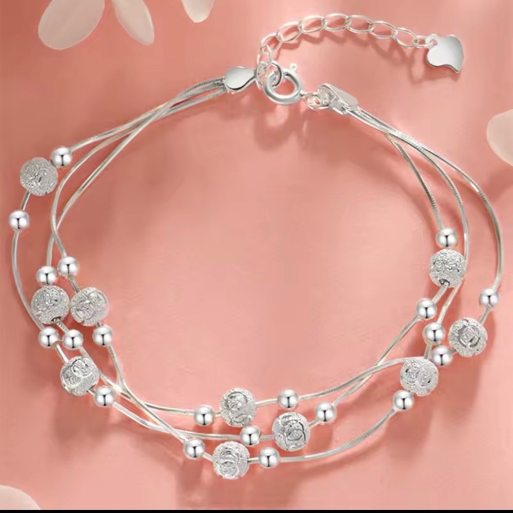 Elegant Silver Bracelet with Beaded Accents